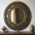 Miroir mural en laiton antique